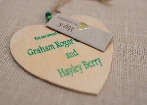 Wooden heart green forest wedding invitation 300x214 - Wood and natural wedding stationery
